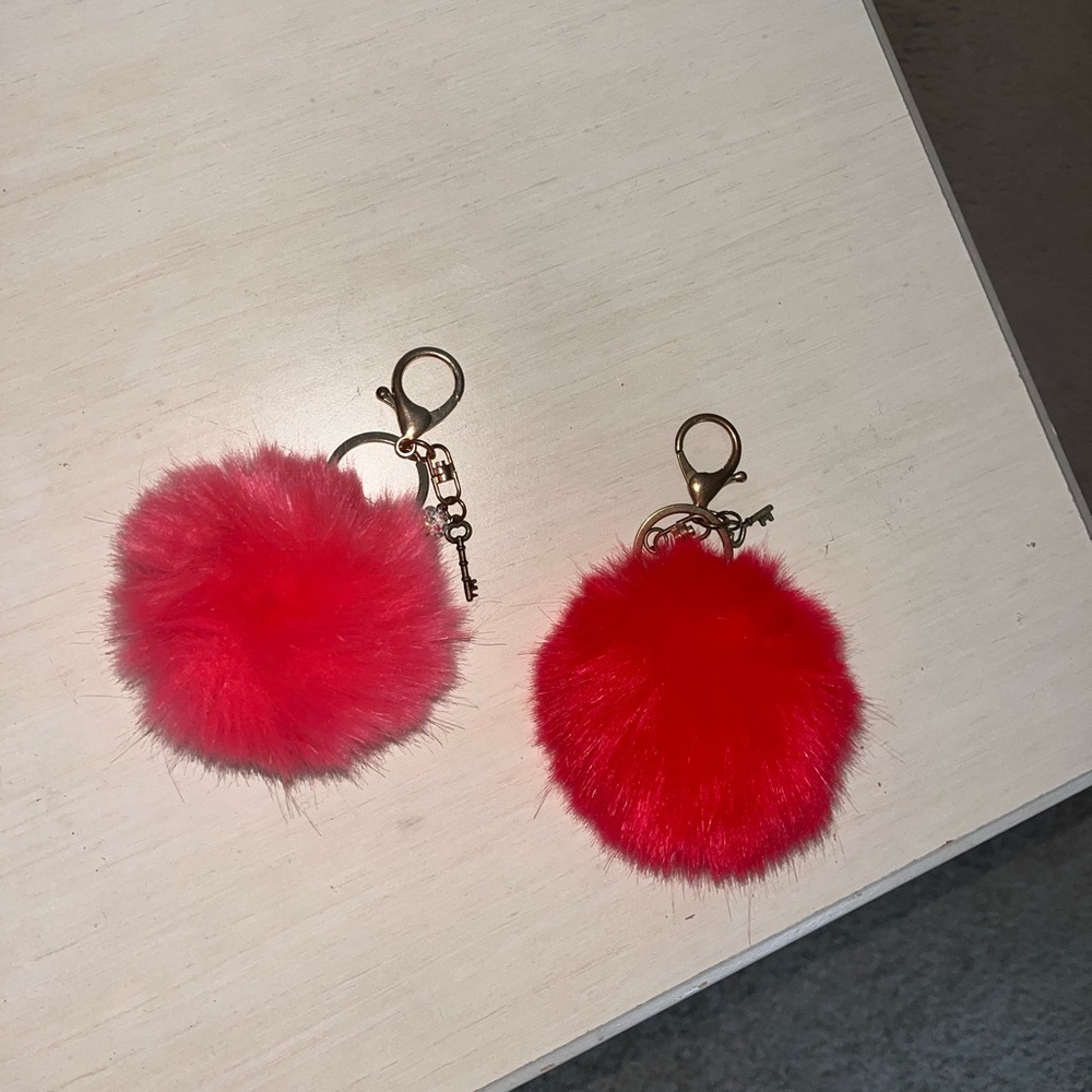 Fuzzy red and pink charm keychains